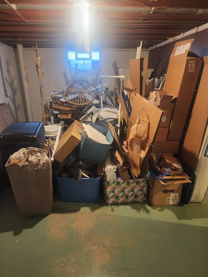 Roll-off dumpster container at job site for 20 Yard Dumpster Rental in Midfield